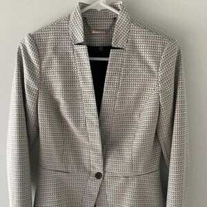 White House Black Market White and Black fitted blazer with cute waist flare